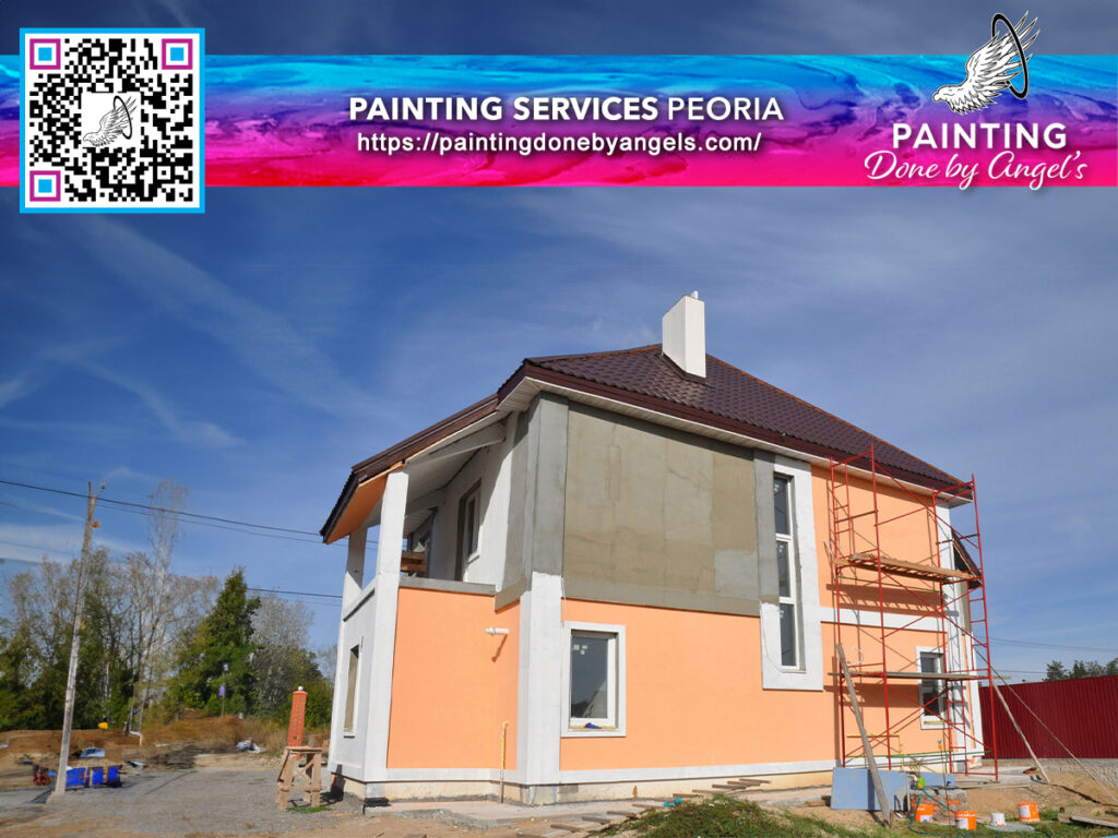 A partially painted house with scaffolding, advertising a "Painting Company Peoria" for both exterior painting and interior painting, accompanied by a QR code and website link.