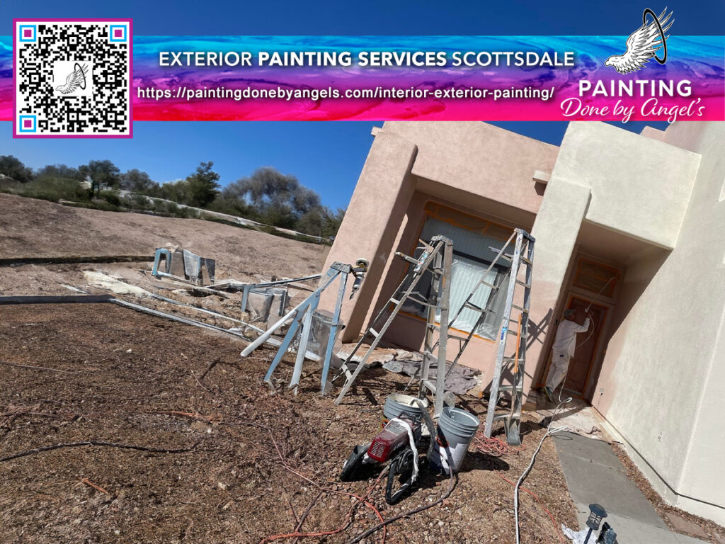 Exterior home improvement in progress with painting equipment and ladders set up outside a residential building under a clear sky, involving exterior painting services.