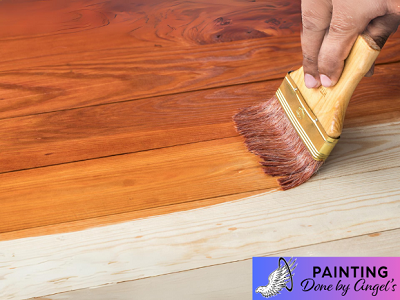 Refreshing an exterior wooden surface with a stroke of varnish.