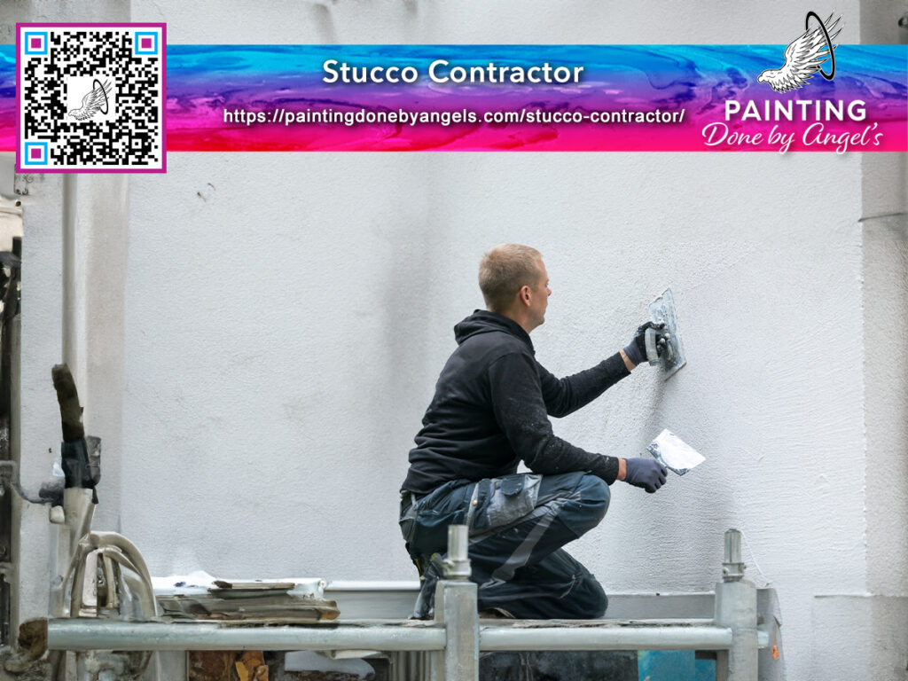 A man on a scaffold repairing stucco cracks on a building wall, including a QR code and logos for "stucco contractor" and "painting done by angels.